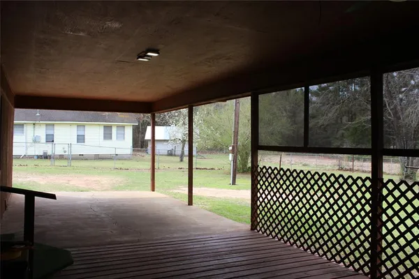 a view of a livingroom with wooden floor