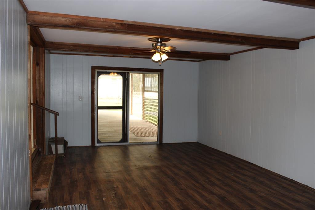 3800 Dorcheat Road Minden, LA 71055 - Photo 22 of 40 wooden floor in an empty room with a window