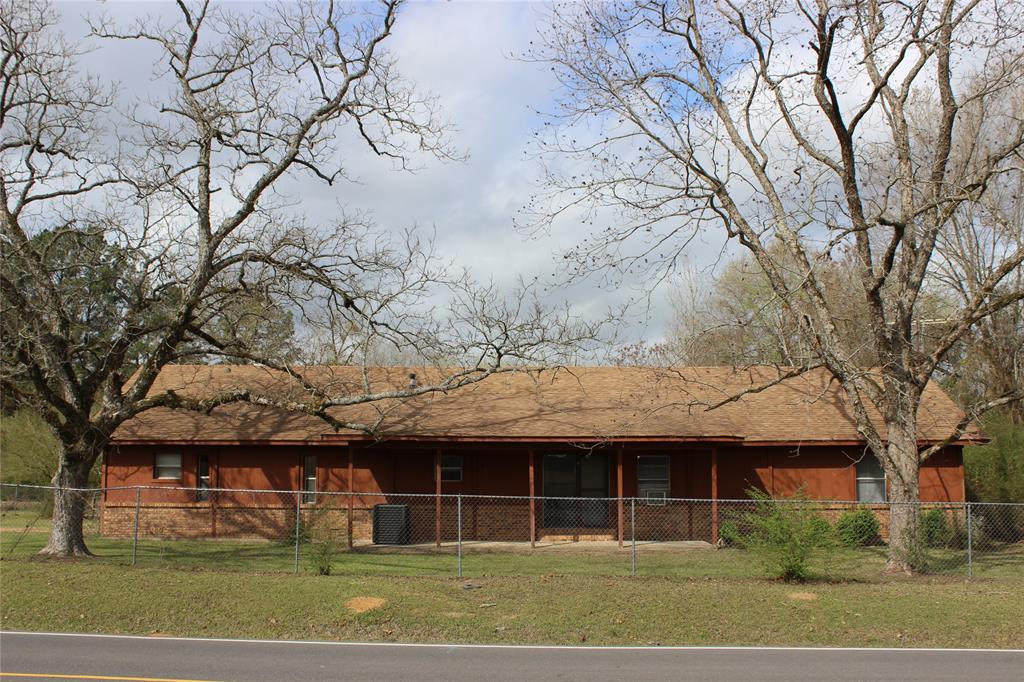 3800 Dorcheat Road Minden, LA 71055 - Photo 3 of 40 a front view of a house with a garden