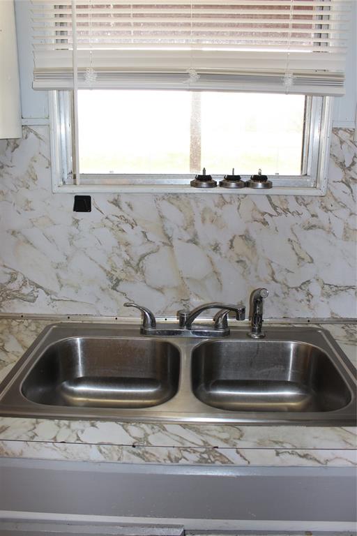 3800 Dorcheat Road Minden, LA 71055 - Photo 31 of 40 a close view of sink and tap