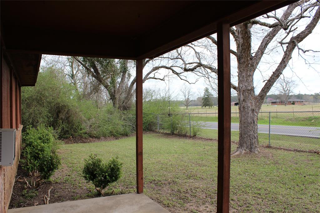 3800 Dorcheat Road Minden, LA 71055 - Photo 9 of 40 a view of a yard with a tree in the background