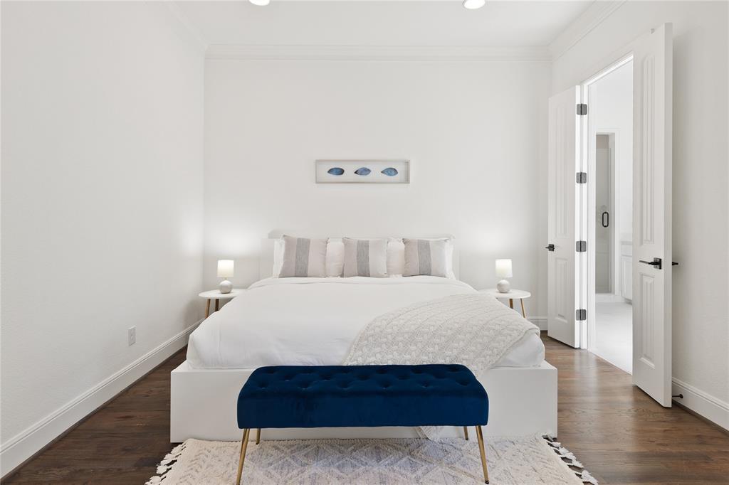 5014 Mission Avenue, Unit A Dallas, TX 75206 - Photo 18 of 26 a bedroom with a bed and a table