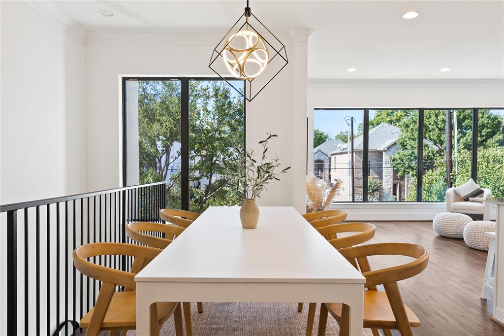 5014 Mission Avenue, Unit A Dallas, TX 75206 - Photo 6 of 26 a view of a dining room with furniture window and wooden floor