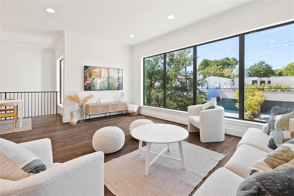 5014 Mission Avenue, Unit A Dallas, TX 75206 - Photo 7 of 26 a living room with furniture and a large window