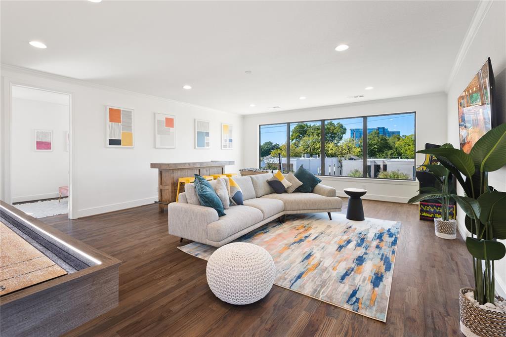 5014 Mission Avenue, Unit A Dallas, TX 75206 - Photo 9 of 26 a living room with furniture and a large window