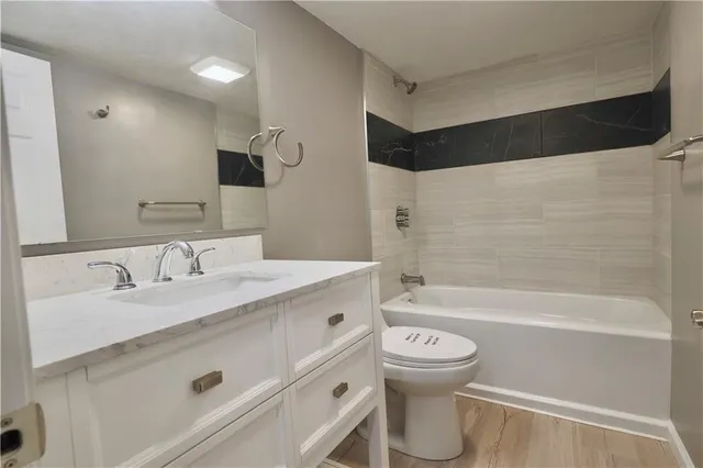 a view of staircase with white walls and windows