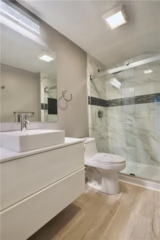 a view of a hallway with windows