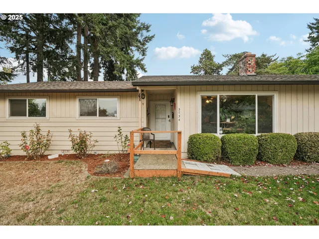 a house view with a garden space