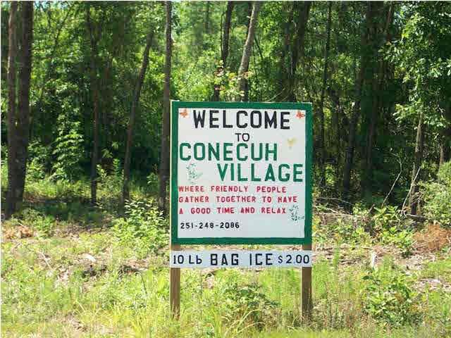 4963 Brushy Creek Road Brewton, AL 36426 - Photo 6 of 11 This is the Conecuh Village sign