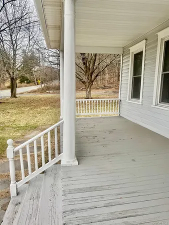a view of a street with a building