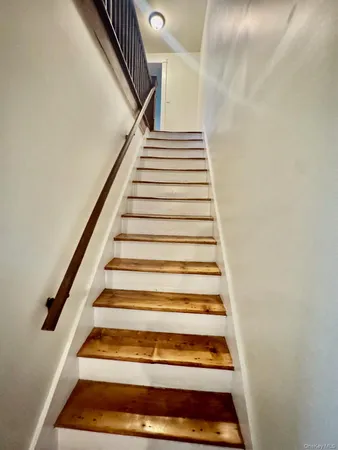 a bathroom with a bathtub a sink a toilet and a shower