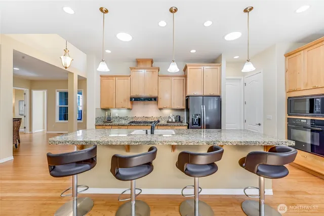a kitchen with lots of counter space furniture and kitchen view