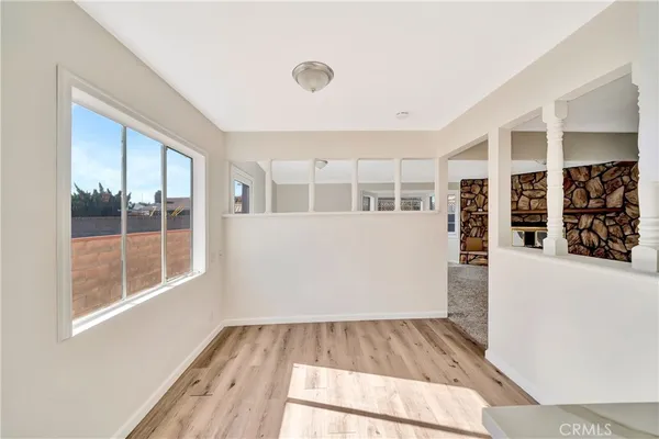 a view of entryway with bathroom