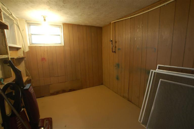 2180 Harris Ferry Road Irvine, KY 40336 - Photo 22 of 27 Several storage areas in the basement.