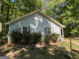 809 John W Breedlove Road Monroe, GA 30656 - Photo 3 of 11 a view of a house with yard and garden