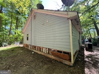 809 John W Breedlove Road Monroe, GA 30656 - Photo 5 of 11 a view of a small house with a yard
