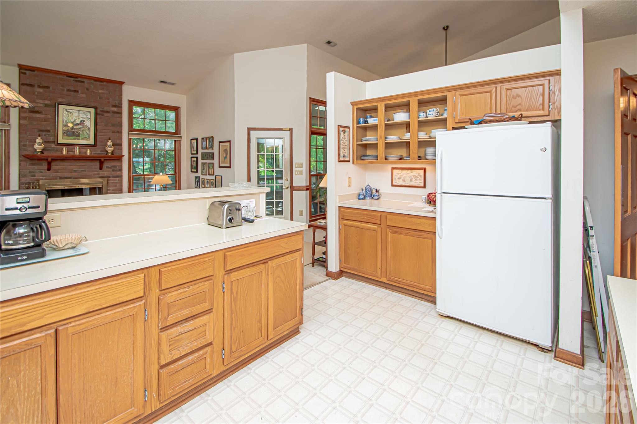 10801 Whitfield Ridge Drive Charlotte, NC 28277 - Photo 15 of 47 a kitchen with granite countertop cabinets and refrigerator