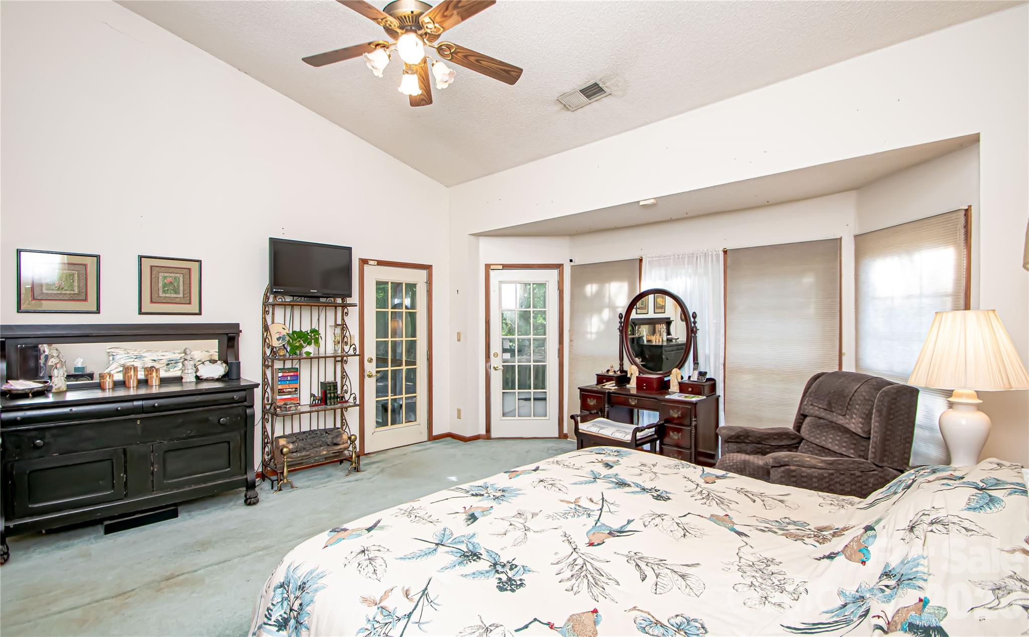 10801 Whitfield Ridge Drive Charlotte, NC 28277 - Photo 21 of 47 a bed room with a bed and a large mirror