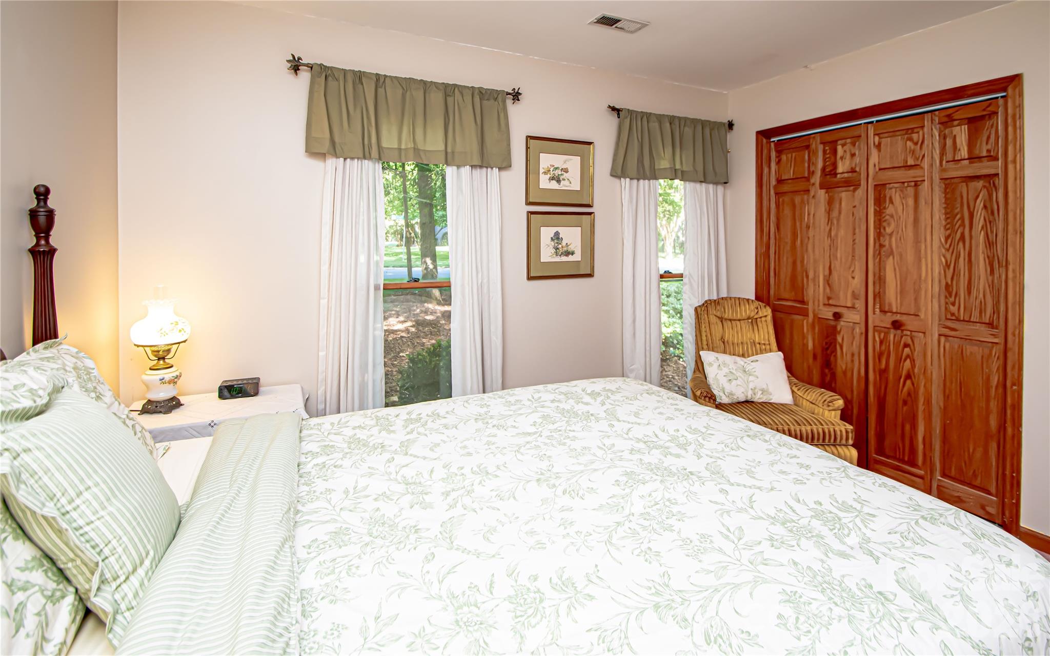 10801 Whitfield Ridge Drive Charlotte, NC 28277 - Photo 24 of 47 a bedroom with a bed and a table