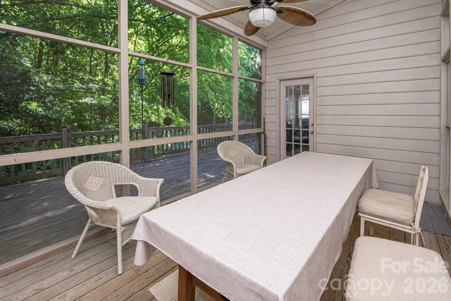 10801 Whitfield Ridge Drive Charlotte, NC 28277 - Photo 30 of 47 a view of a patio with a table chairs and garden