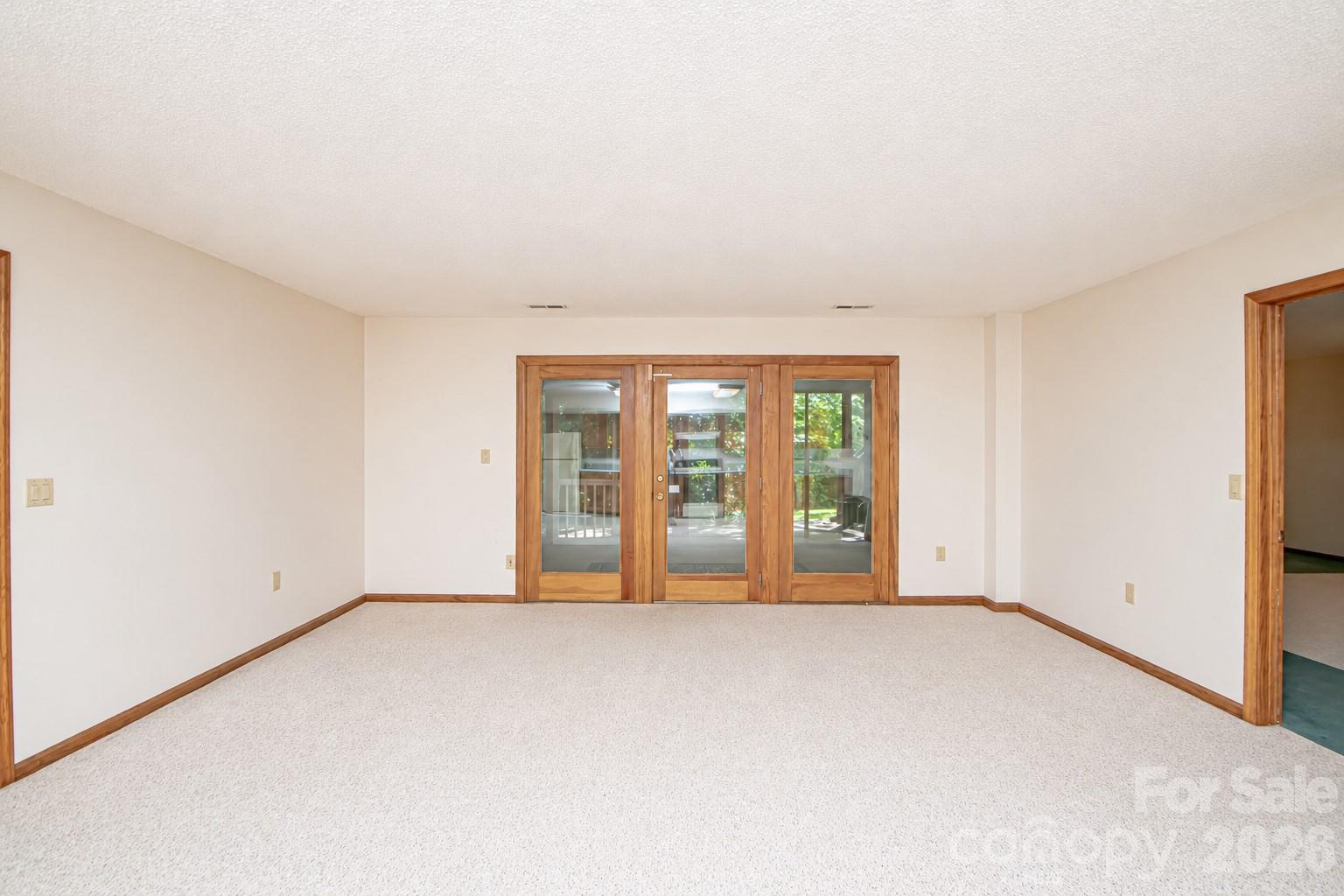 10801 Whitfield Ridge Drive Charlotte, NC 28277 - Photo 34 of 47 an empty room with windows