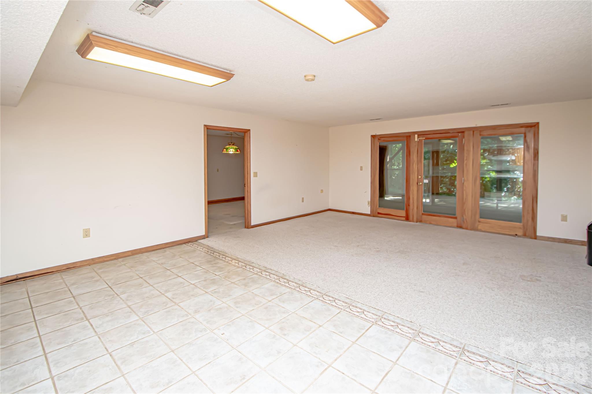 10801 Whitfield Ridge Drive Charlotte, NC 28277 - Photo 35 of 47 an empty room with windows