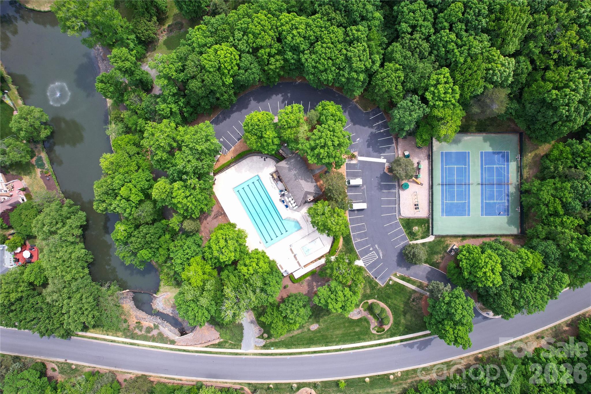 10801 Whitfield Ridge Drive Charlotte, NC 28277 - Photo 45 of 47 an aerial view of a house with a yard and potted plants