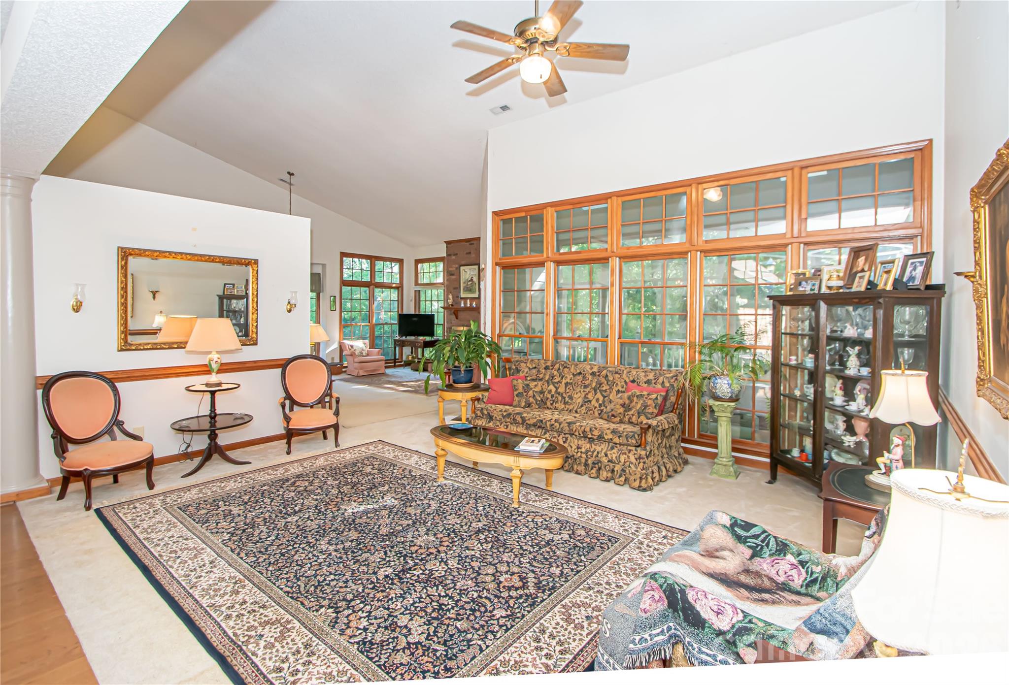 10801 Whitfield Ridge Drive Charlotte, NC 28277 - Photo 6 of 47 a living room filled with furniture and a rug