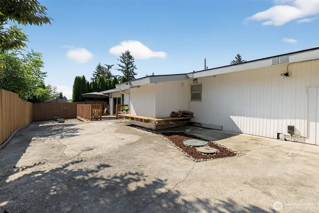 a view of a backyard of a house