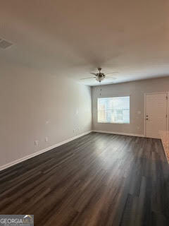 103 Brexley Drive Calhoun, GA 30701 - Photo 13 of 28 an empty room with wooden floor and windows