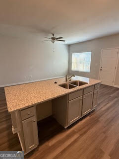 103 Brexley Drive Calhoun, GA 30701 - Photo 14 of 28 a kitchen with stainless steel appliances granite countertop a sink stove and wooden floor