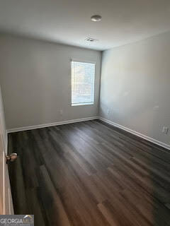 103 Brexley Drive Calhoun, GA 30701 - Photo 24 of 28 an empty room with wooden floor and windows