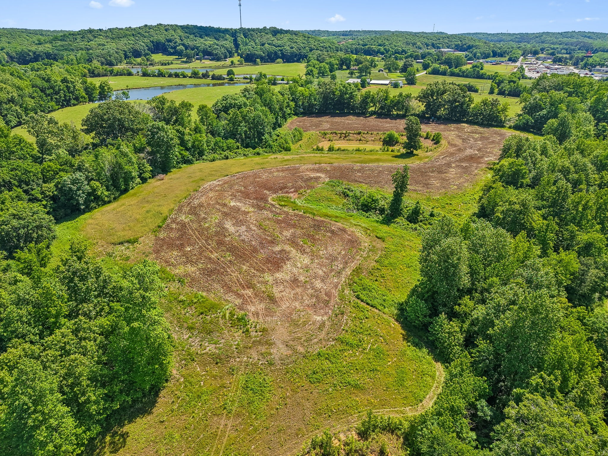 0 Rochelle Lane Hurricane Mills, TN 37078 - Photo 20 of 69 a view of a lake with a big yard