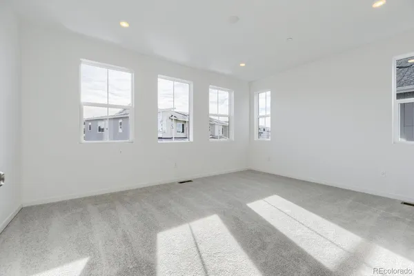 an empty room with windows