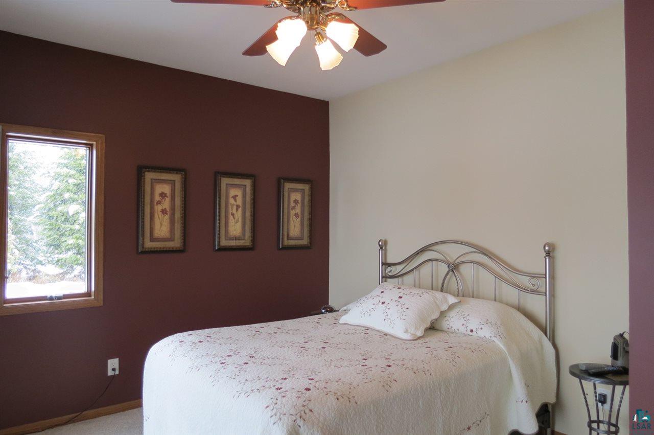 134 West Stark Road Esko, MN 55733 - Photo 9 of 24 M suite w 3/4 bath and walk in closet, private covered patio