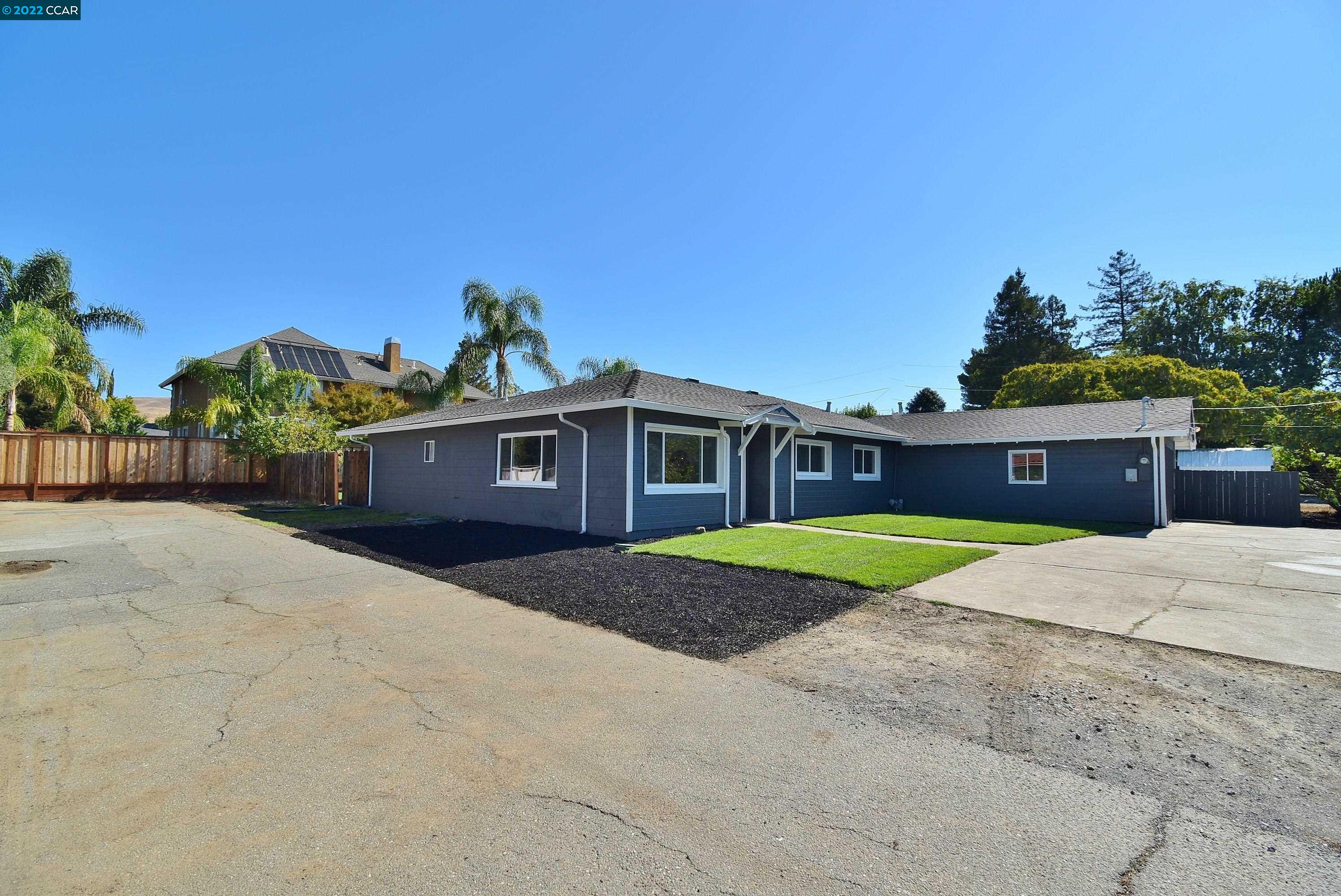 5213 Olive Drive Concord, CA 94521 - Photo 1 of 1 a front view of a house with a yard