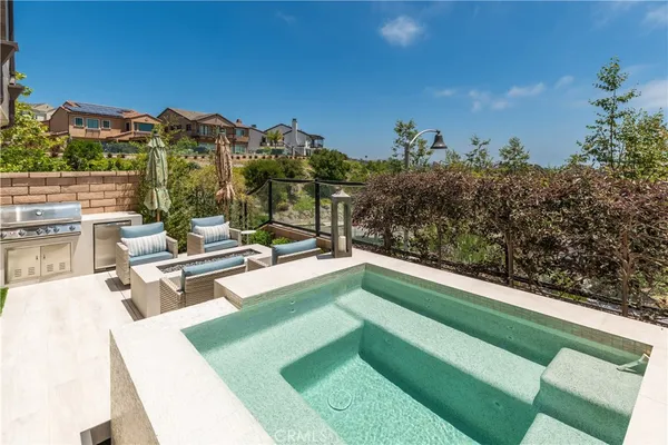 a view of a swimming pool with a terrace