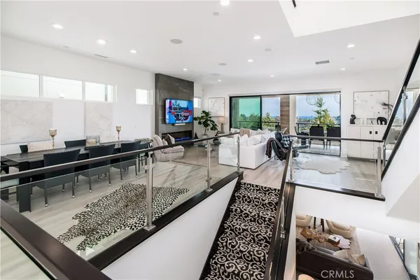 a view of a living room and dining room