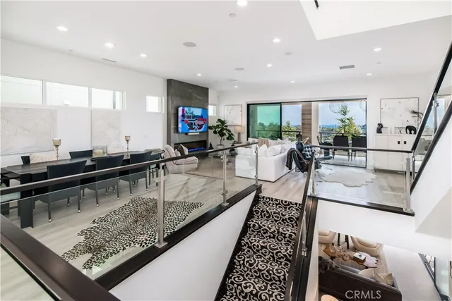 a view of a living room and dining room