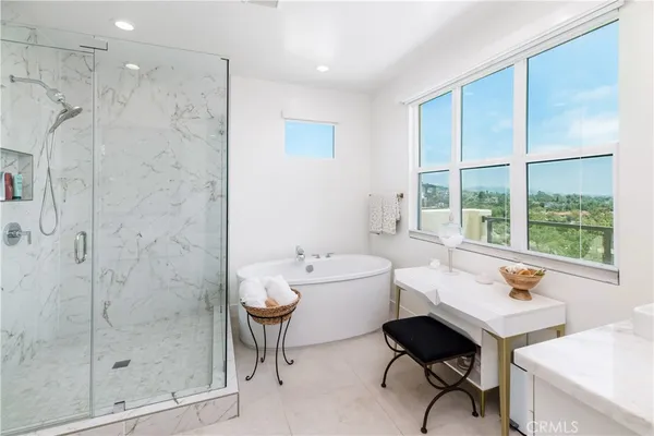 a bathroom with a bathtub sink and toilet