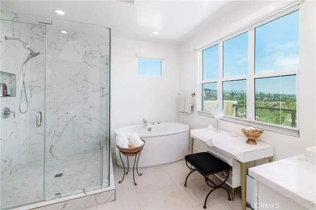 a bathroom with a bathtub sink and toilet