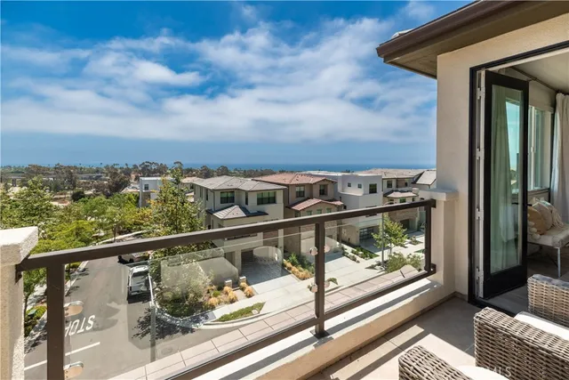 a view of balcony with furniture