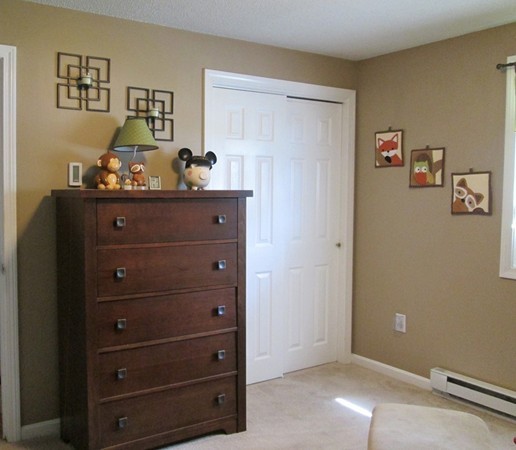 64 Brookside Avenue Webster, MA 01570 - Photo 16 of 30 a bed room with a bed and a window