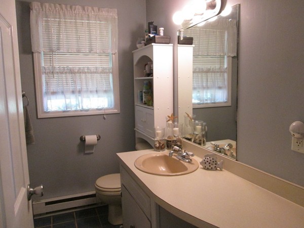 64 Brookside Avenue Webster, MA 01570 - Photo 19 of 30 a bathroom with a sink toilet and shower