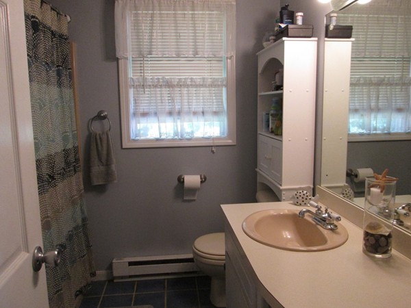 64 Brookside Avenue Webster, MA 01570 - Photo 20 of 30 a bathroom with a sink toilet and shower