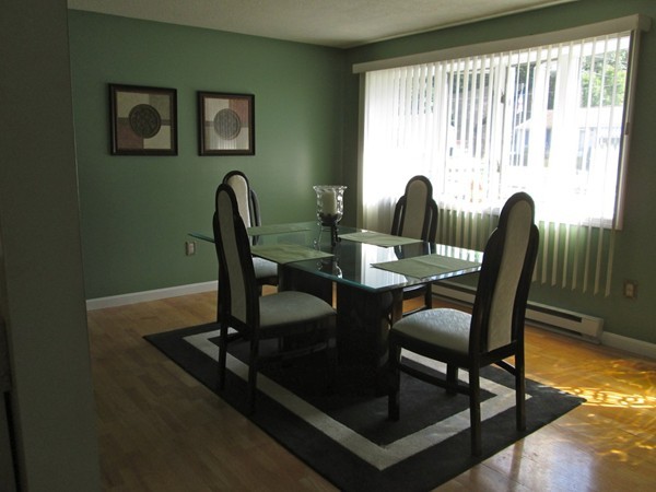 64 Brookside Avenue Webster, MA 01570 - Photo 9 of 30 a view of a dining room with furniture window and outside view