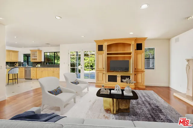 a living room with furniture and window