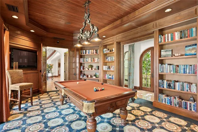 a bedroom with bed and window