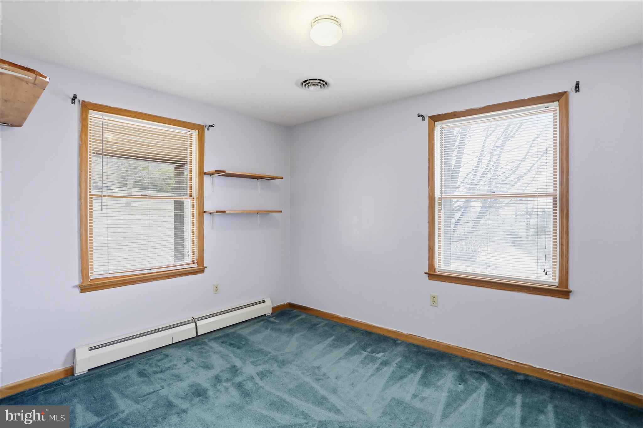 529 Braddock School Road Slanesville, WV 25444 - Photo 18 of 44 an empty room with a window