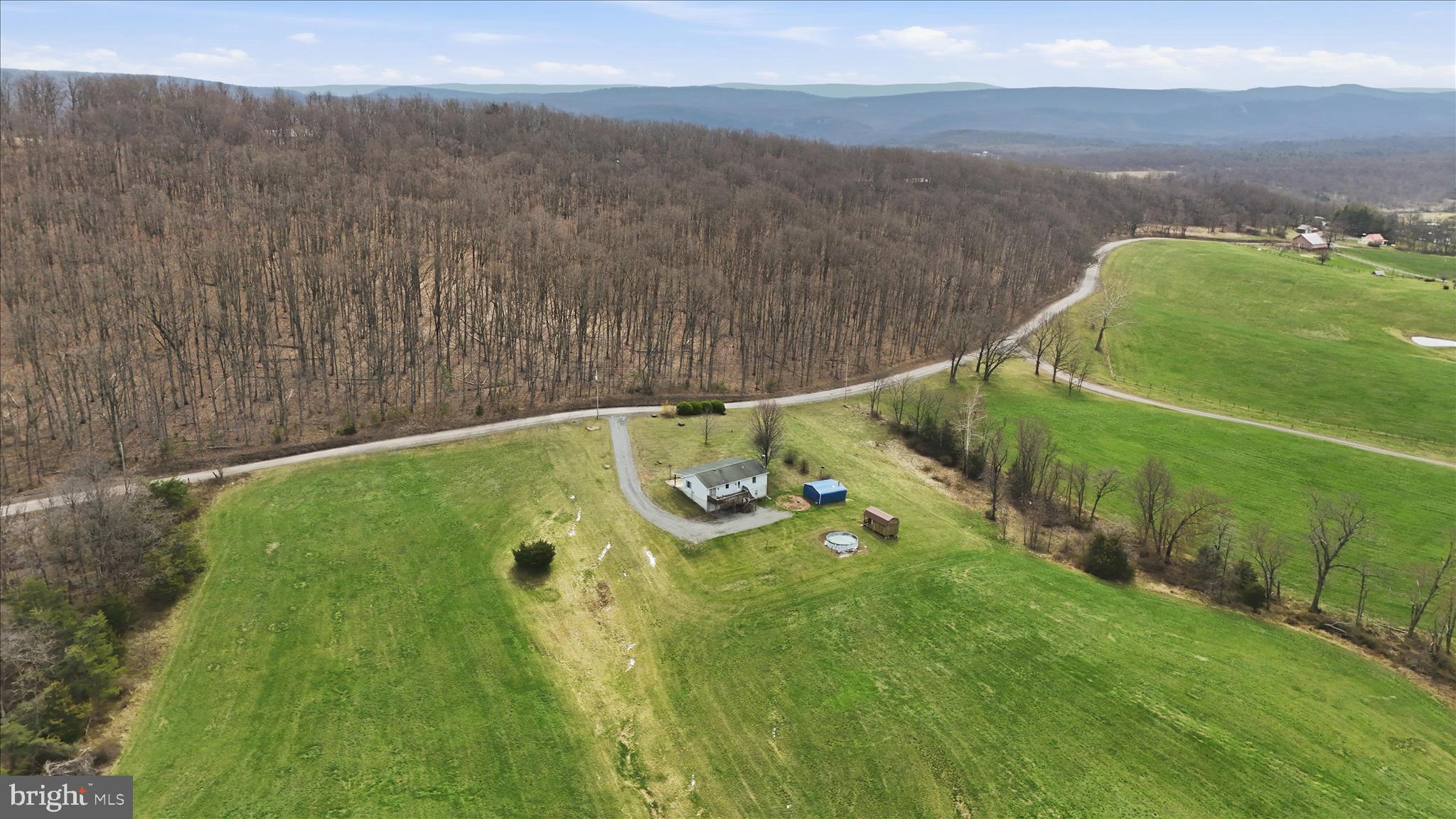 529 Braddock School Road Slanesville, WV 25444 - Photo 2 of 44 an aerial view of a residential houses with outdoor space and trees